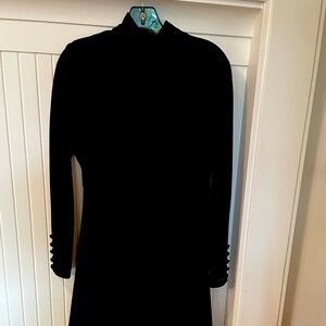 The perfect little black dress. Fitted waist, lined with full skirt. Like new.